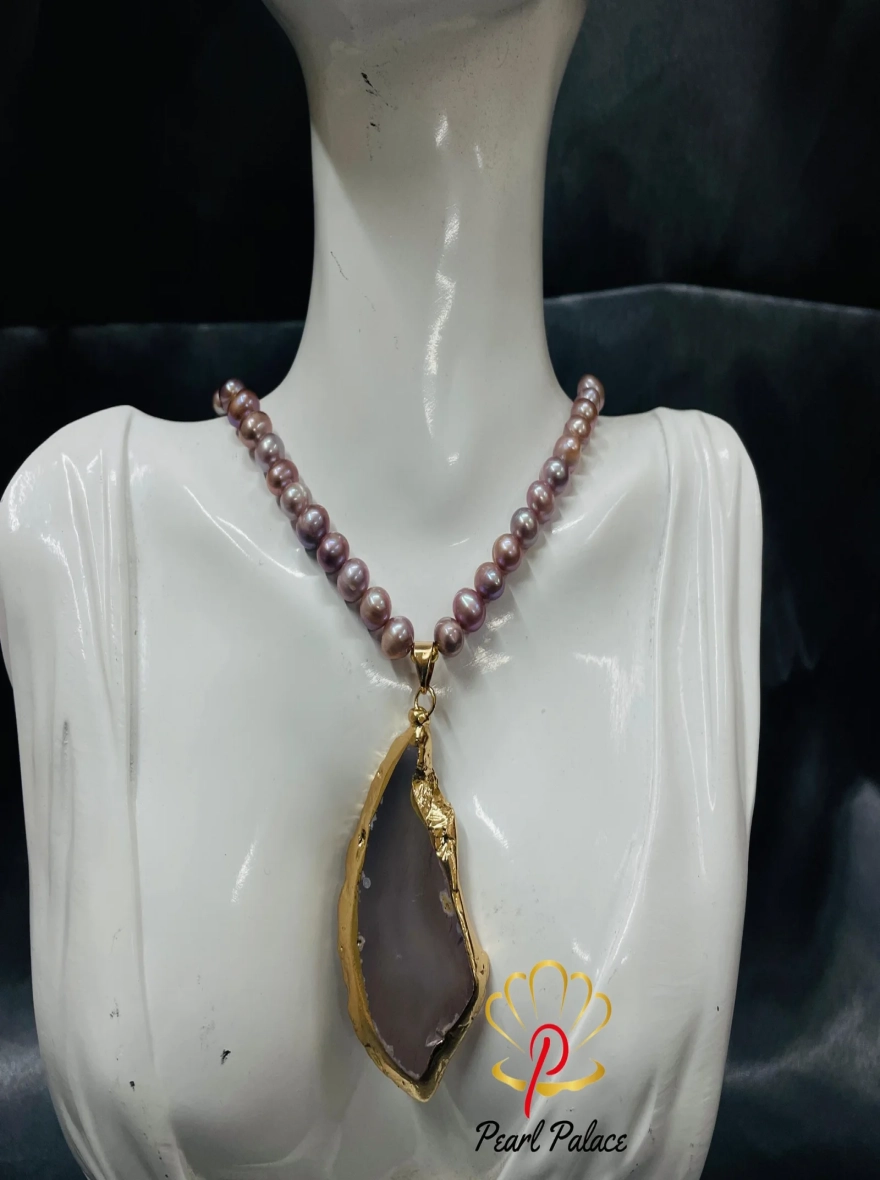 Purple fresh water pearl with chatting stone