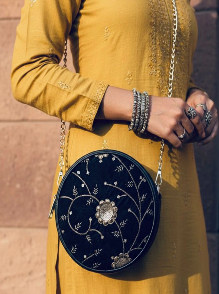 Elegant Silver Zari Round Bag