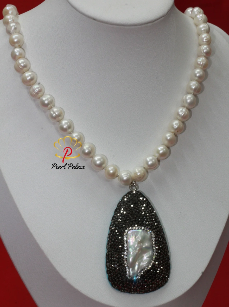 White Pearl Necklace with Black Crystal and Shell Pearl Pendant.
