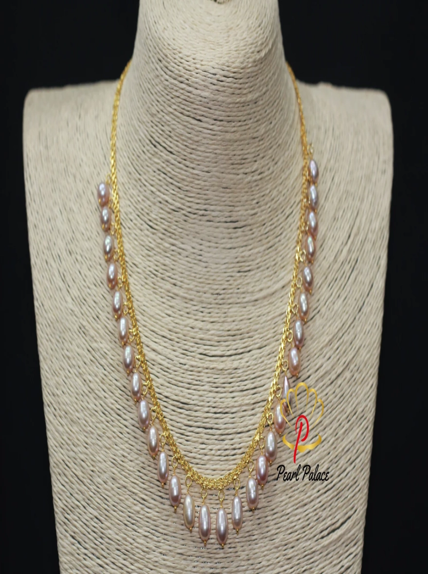 Peach Rice Pearl and Gold-Plated Necklace and Earring Set.