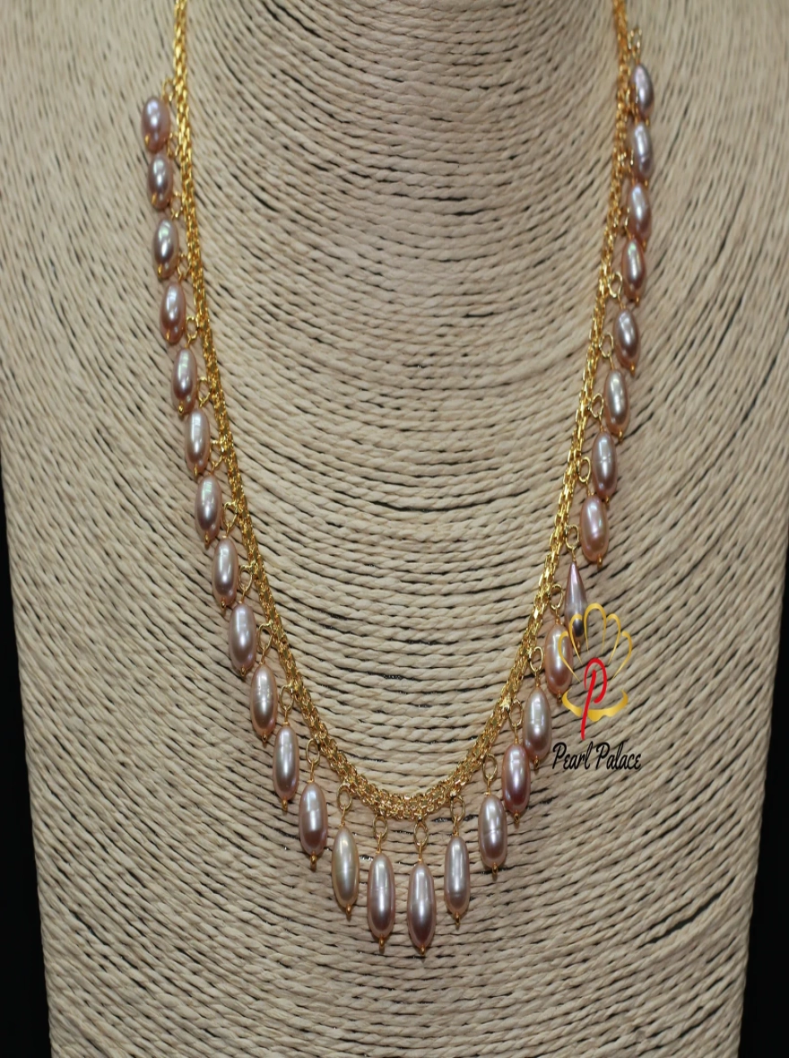 Peach Rice Pearl and Gold-Plated Necklace and Earring Set.