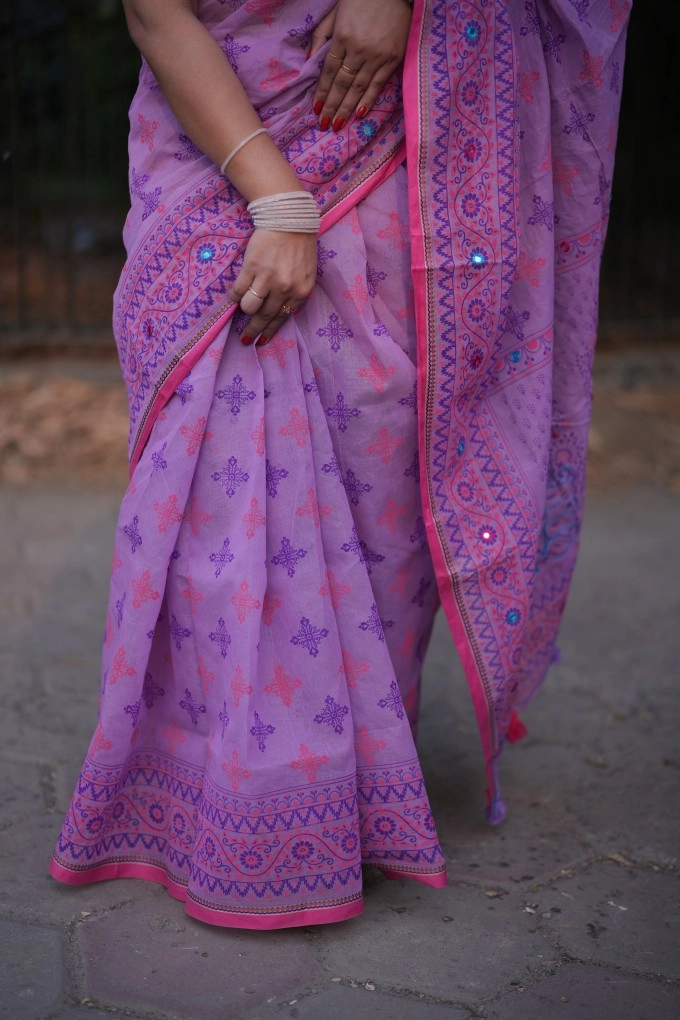 Prijosree Signature Boutique –Multicolour screen Print Saree with tarsel and doller design.