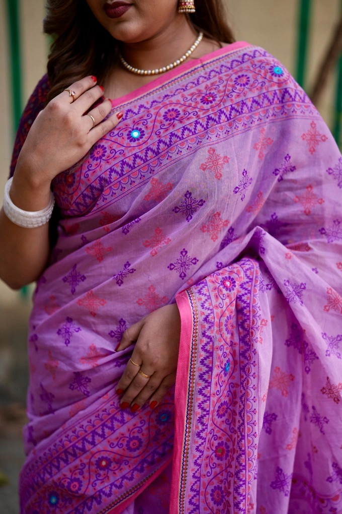 Prijosree Signature Boutique –Multicolour screen Print Saree with tarsel and doller design.