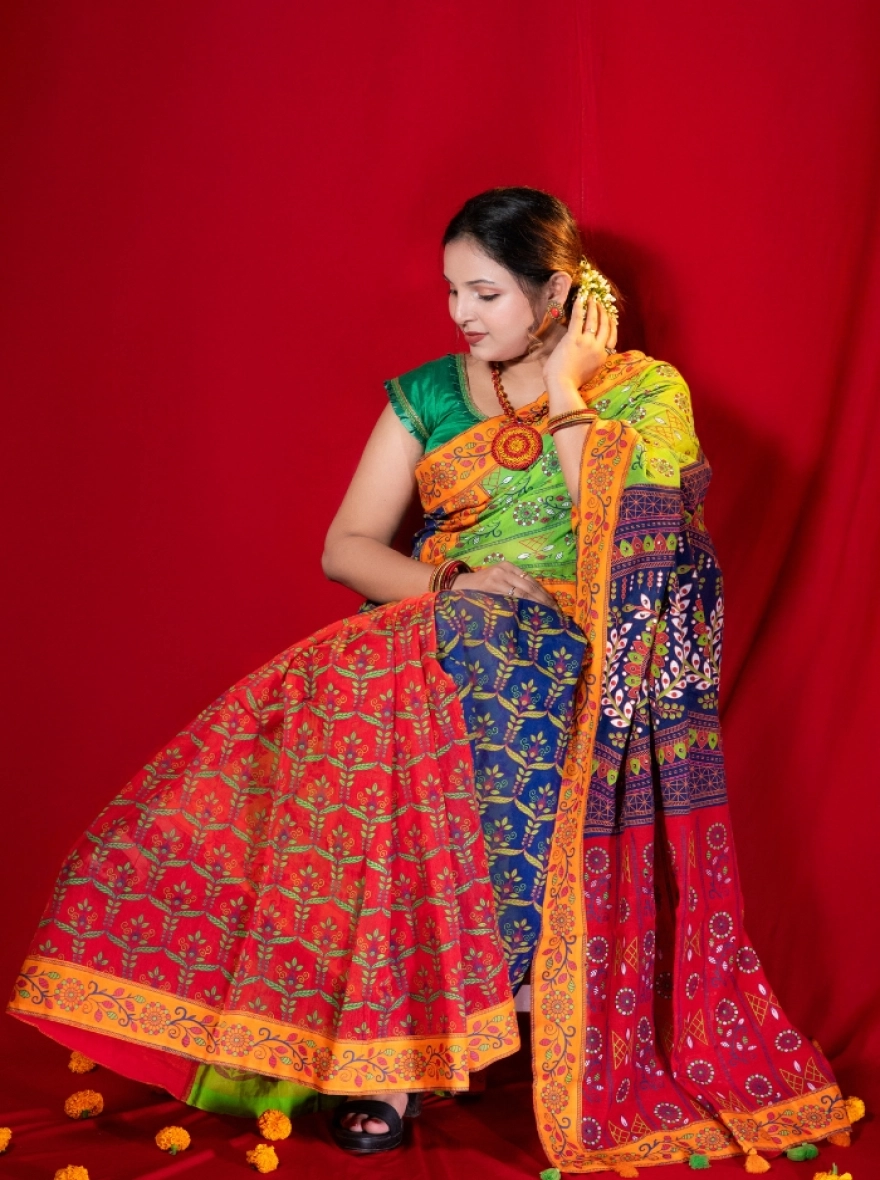 Prijosree Signature Boutique –Multicolour Weave Print Saree with tarsel and doller design
