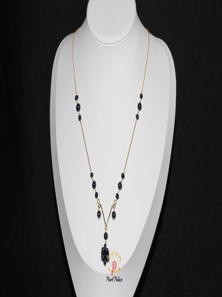 Black Pearl Y-Necklace with Gold Accents.