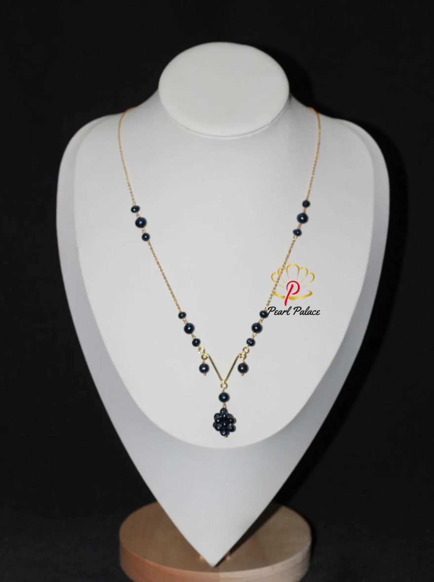 Black Pearl Y-Necklace with Gold Accents.