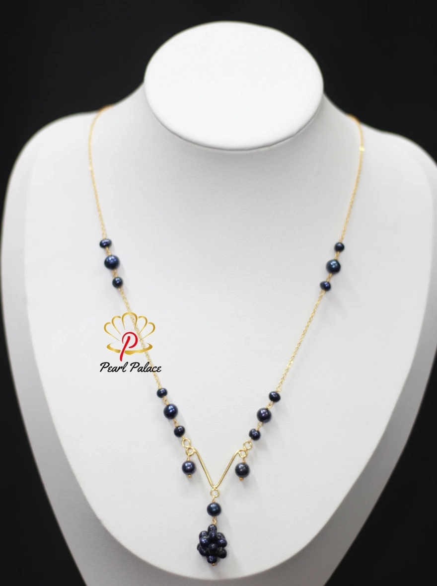 Black Pearl Y-Necklace with Gold Accents.